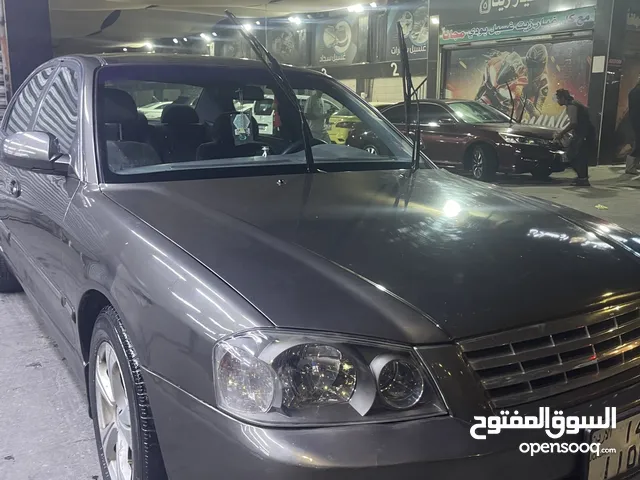 كيا اوبتيما 2002 للبيع (كاش فقط)