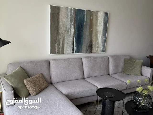 Grey coloured Modern Style Sofa in Great State Almost like New Fits up to 6 people