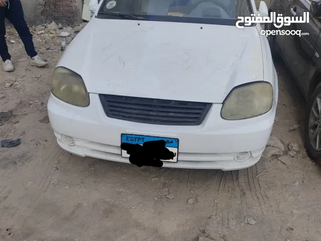 سياره ڤيرنا 2015 اللون ابيض مرور البساتين رخصه سنه  تحتاج لمصروف  مطلوب 270.000الف