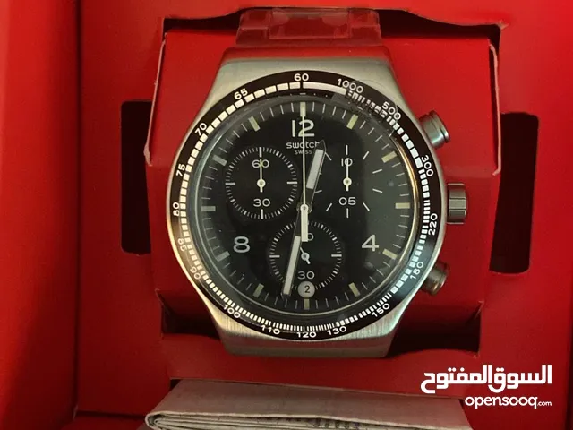 ساعة سواتش فضي اللون معدنية عقارب و يطارية