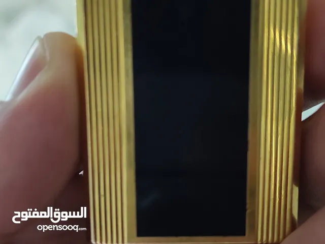ولاعة ديبون مطلية بالذهب صناعة فرنسية أصلية ورنيش صيني قطعة جميلة جدا