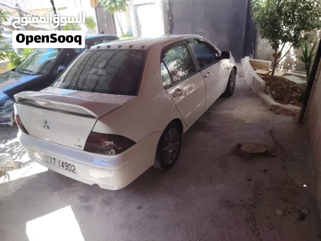 2001 ميتسوبيشي لانسر Standard