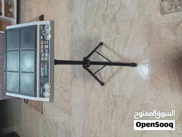 بيركشن كهريك نوع roland spds,  معو  برنامج  وستاند  ومحول