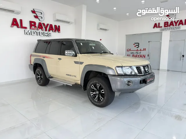 نيسان باترول سوبر سفاري قير أتوماتك بيج رمادي / زعفراني خليجي 2024