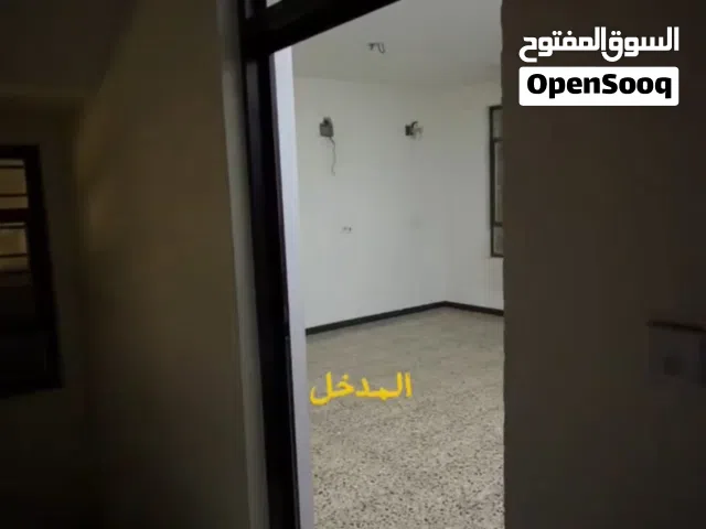 شقة سكنيه طابق اول في منطقة الوزيرية - شارع الزهاوي
