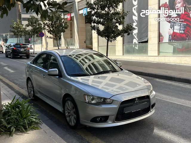 لانسر فحص كامل 7جيد1.6محرك اقتصادي جير أوتوماتيك كت رالي ارت ياباني اصلي كراسي جلد وقماش الياباني