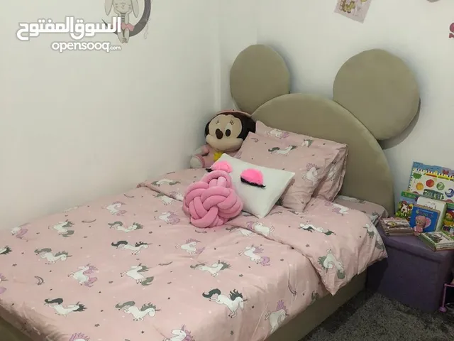 سرير مفرد ونص