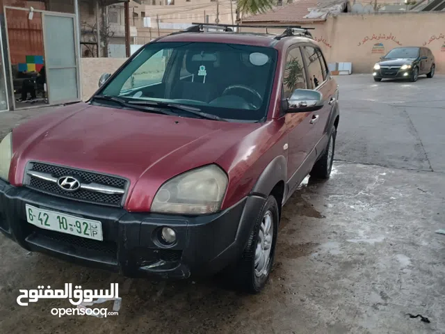 جيب هونداي توسان موديل 2007 ماطور 2000 لون خمري كام لا ينقصه شيئ