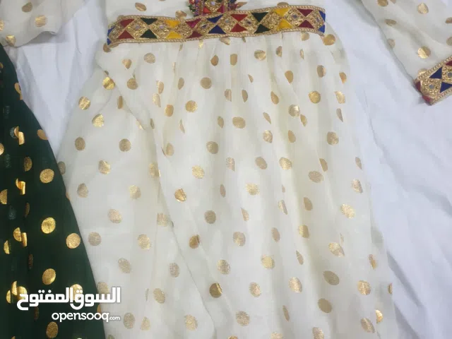 فستان تاسيس لون بيج واخضر