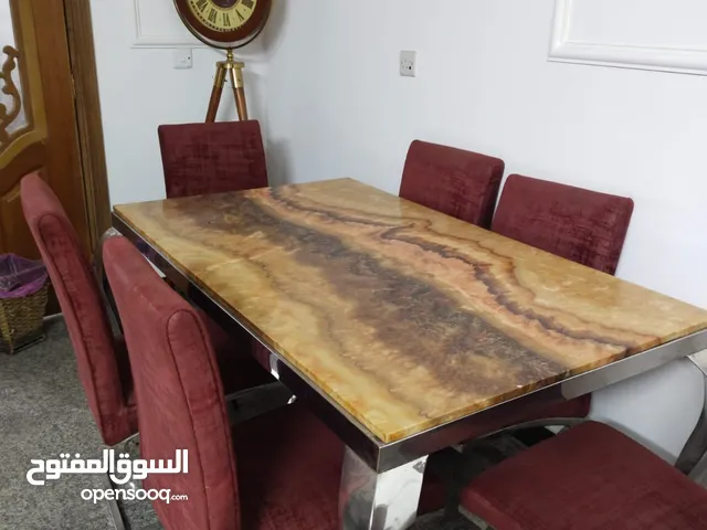 ميز طعام مرمر ثقيل و6 كراسي
