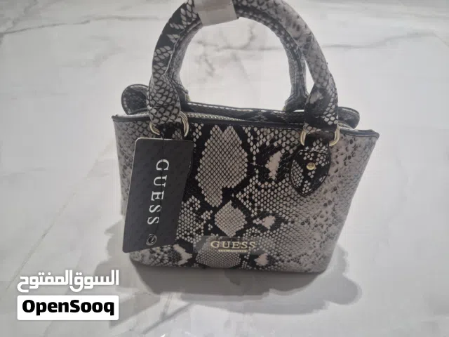NWT discontinued Guess mini python print. حقيبة جيس ميني بنقشة الثعبان جديدة بالتاغ، اصدار مقطوع