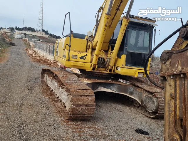 مركبة اشغال انشائية (حفار) نوع كوماتسو موديل 2005