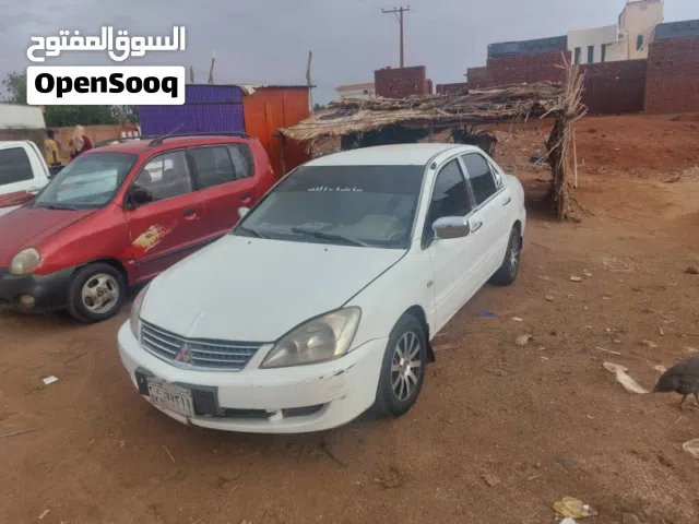 للبيييييع لانسر بومه موديل 2007 مومنه قير عادي شغاله فل بنزين