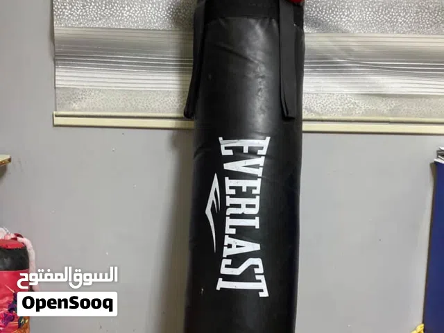 Punching Bag (كيس ملاكمة) Boxing Gloves (قفازات ملاكمة)