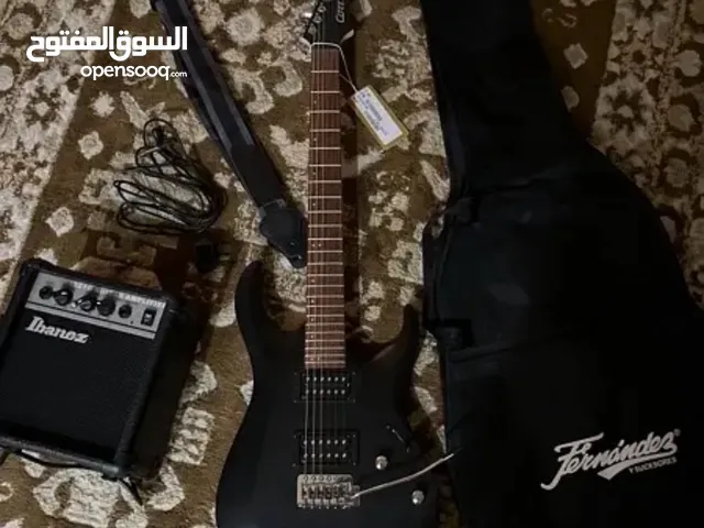 As new electric guitar جيتار كهربائي كالجديد