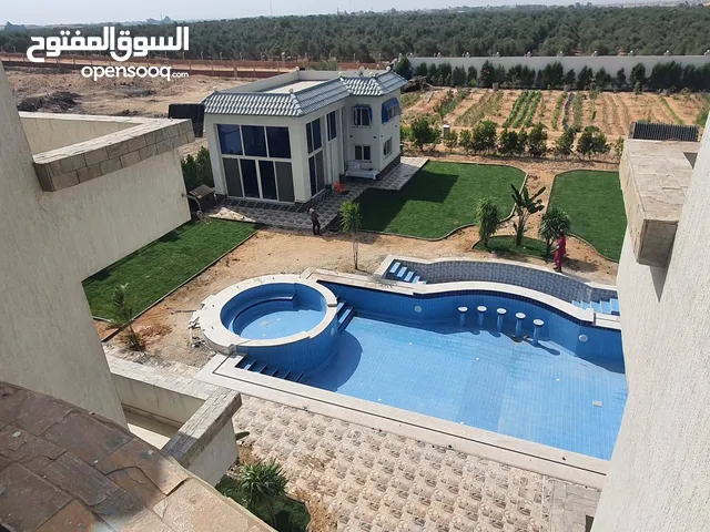 1800 m2 More than 6 bedrooms Villa for Sale in Giza Sheikh Zayed