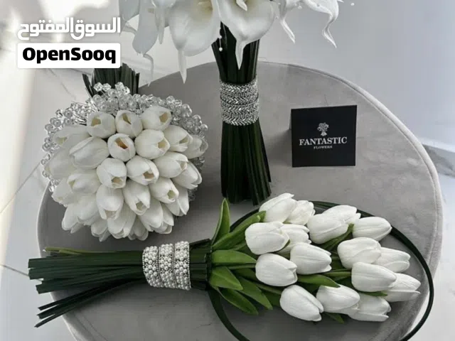 بوكيه أزهار أبيض فخم للعروس صناعي  باقة توليب أنيقة مزينة بلؤلؤ وخرز ناعم، شكلها طبيعي handmade