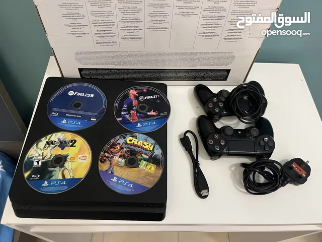ps4 with 5 games and 2 controllers