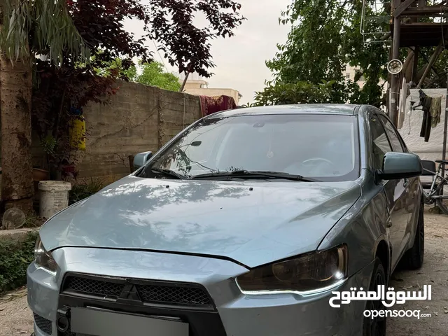 ميتسوبيشي فحص نظيف 100% موديل 2010 سياره كثير كثير ممتازه موتور 1005 جير موتور فحص 100% توماتيك المع