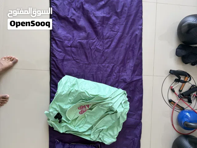 Camping mattress and sleeping bag from Tomorrowland. And Another mattress