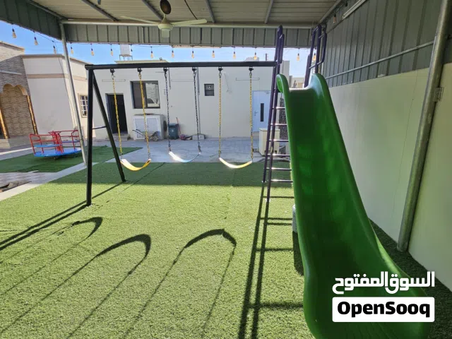 العاب الحديقه مرجوحه مع زحلوقه مع دواريه