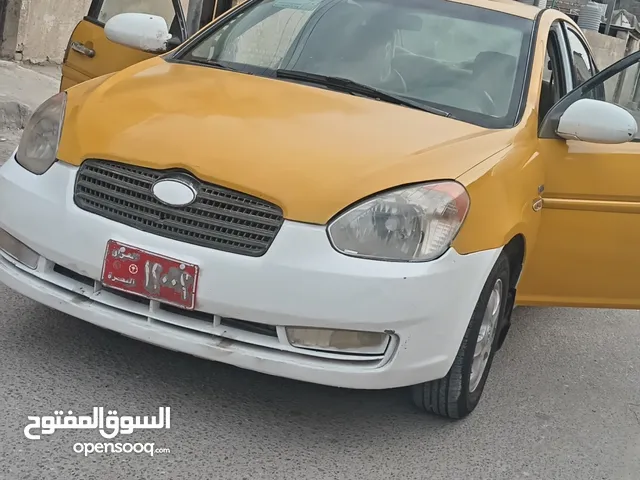 هونداي اكسنت خليجية لون اصفر تكسي