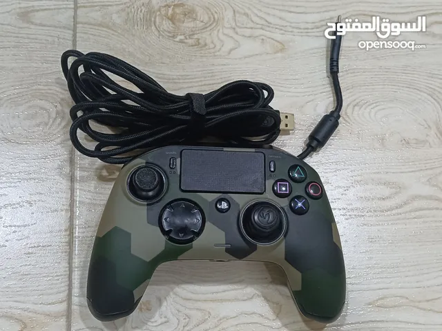 يده حترافيه من شركه نيكون ل بلي فور وفايف مستعمل قليل تجي وياه وايرها