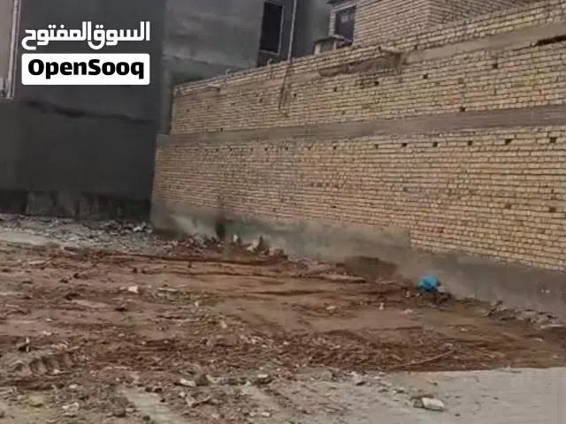 قطعه أرض ملك صرف الاكوات الاولى قرب شارع البزل المساحه 150 م واجه 10 م النزال 15م