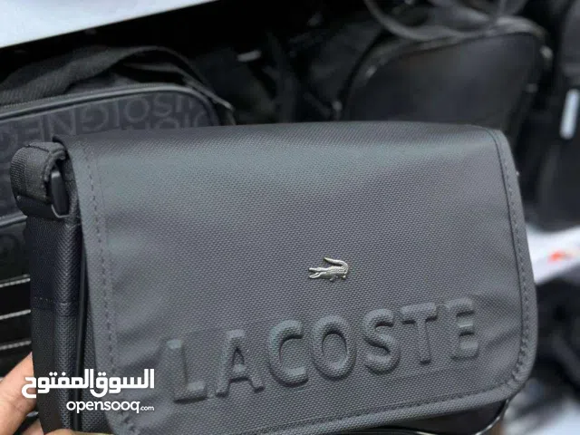 Sacoche Lacoste vert et gucci