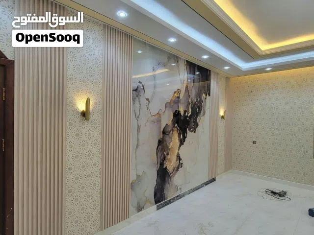ديكور جدار خلف شاشة التلفزيون – تصاميم خشبية وعصرية للصالات والمجالس
