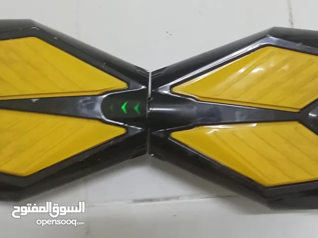 hover board black and yellow working charger included