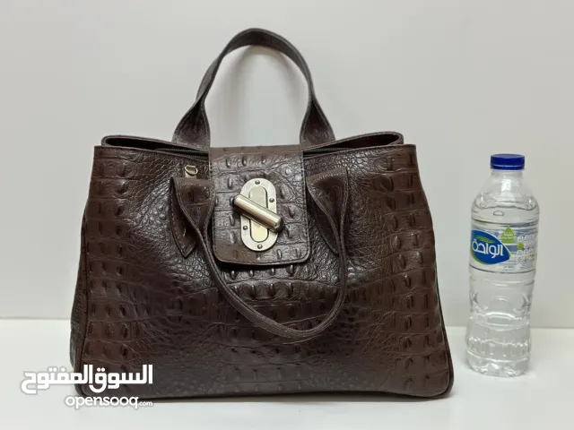 Hand Bags brown for sale  in Al Ain
