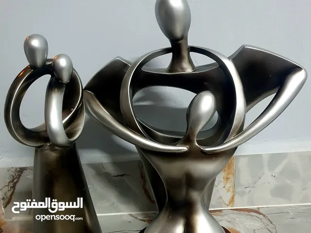 Collection of various artistic metallic sculptures, each with its own unique design and form