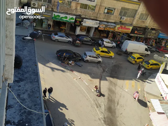 الدوار /مقابل التل الاخضر مجمع الحواري التجاري