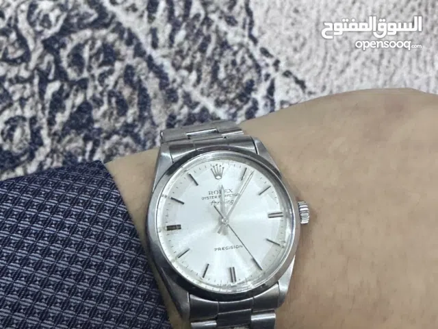 ساعة رولكس اصلية بحالة ممتازة الكرت ضايع لان موجده عندي من زمان