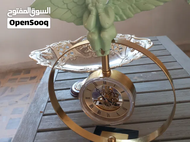 ساعة قديمة للبيع  . محلاية مطلية فضة