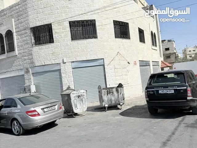 عمارة خلف الاستقلال مول بأول سوق النزهة الشعبي