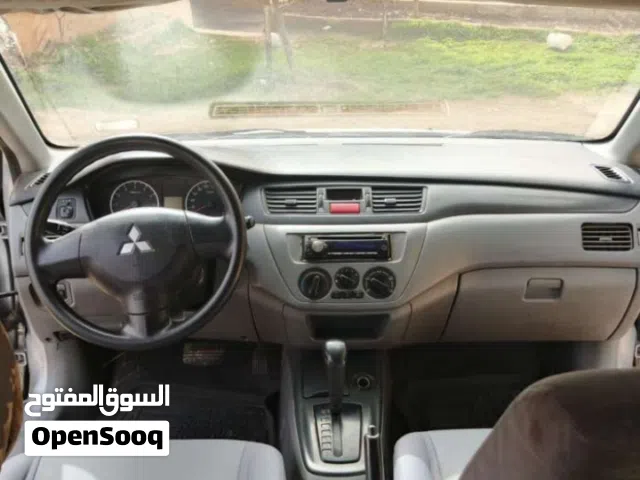 2012 ميتسوبيشي لانسر Standard