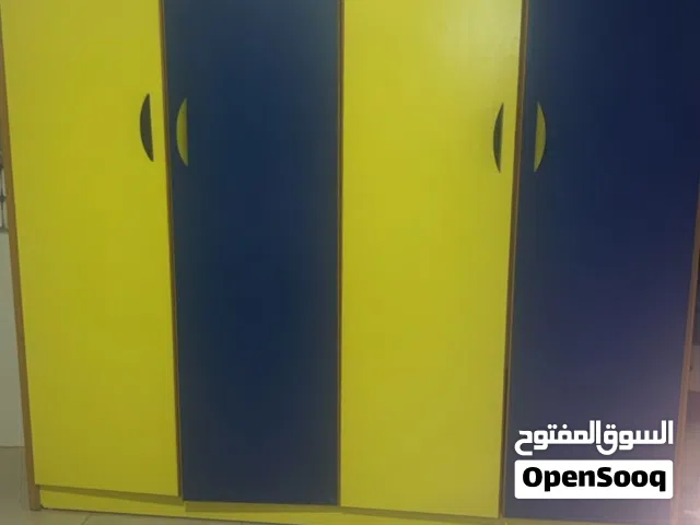 غرفه نوم للاطفال مستعمله باللون الازرق و الاصفر