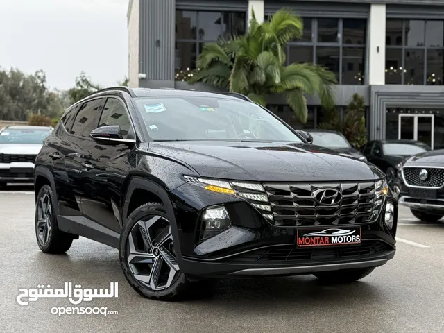 هونداي توسان ترخيص 2022 محرك 1600 هايبرد plug in/يقطع على الشحنه 65 كيلو متر جير أوتوماتيك