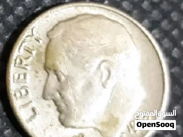 مصكوك قبل 59 سنه =ربع دولار فضي اميريكي =الجودة أنسر=السعر منهي 100دينارللتواصل بالهاتف فقط