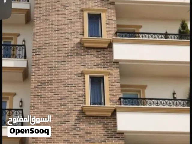 شقة للبيع كبيرة عمارة حديثة تقع في طرابلس بن عاشور وسعاية البدري