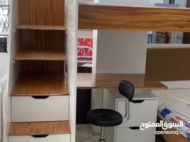غرف نوم للأولاد دورين أضافة إلى مكتب وكرسي مصممه كما هي موضحة بالصوره طبعاً الغرفة خشب أبو 18