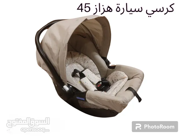 كرسي هزاز وكرسي سيارة