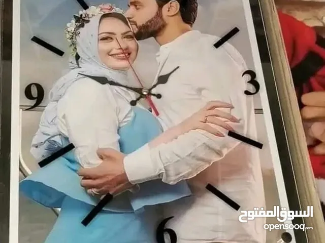 ساعة حائط بصورتك
