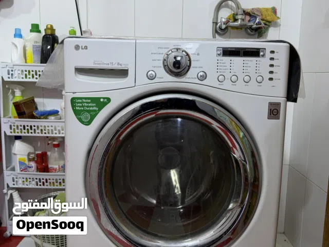 غسالة مع دراير ماركة LG اصلي شغال مية بالمية