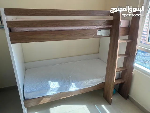 Bunk bed ideal for siblings. With mattresses. Brown color. Opening and transporting is in buyer scop