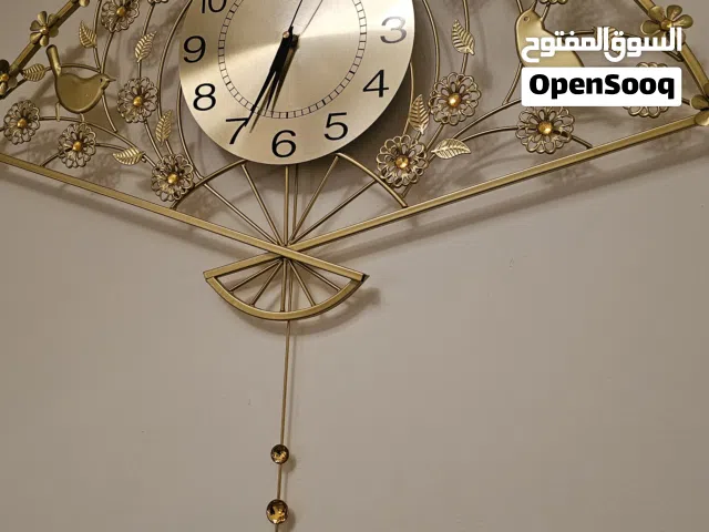 ساعه جداريه مع تعليقه مع مقدمة ديوان حديث وجديد ينفع لديوان سيت متكامل