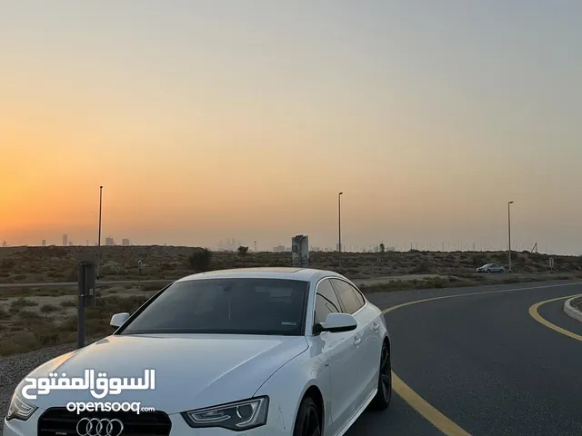 Audi A5 2014 Sportback 2.0L 4 cylinder with single turbo with Sline Quattro package. GCC specs.