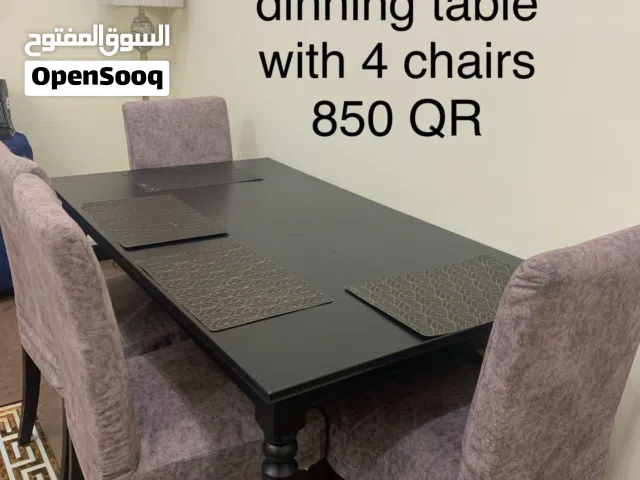 Ikea extended dinning table with 4 chairs